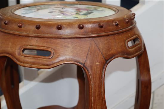 A Chinese hardwood porcelain inset stool W.40cm